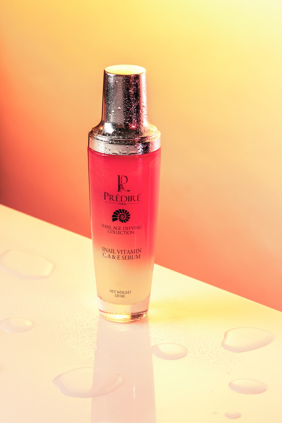 Predire Paris serum bottle with warm gradient