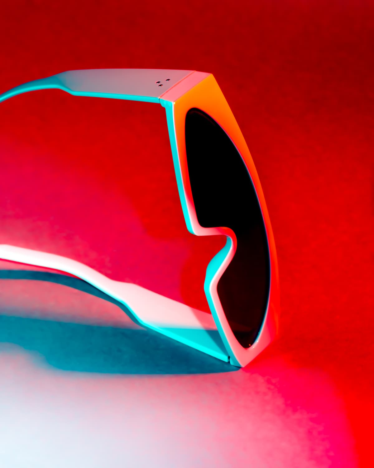 Red and teal sunglasses close-up